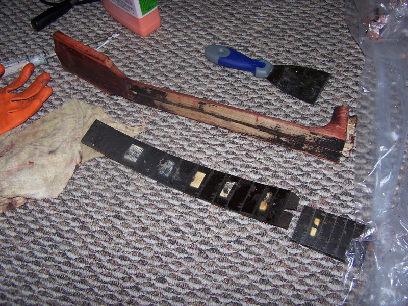 I tore off the old fingerboard, after heating it with an iron. I’m replacing it with a new, natural ebony fingerboard.