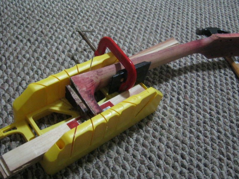 I have to reshape the neck joint. The angle was too low, a problem with a lot of old archtop guitars.