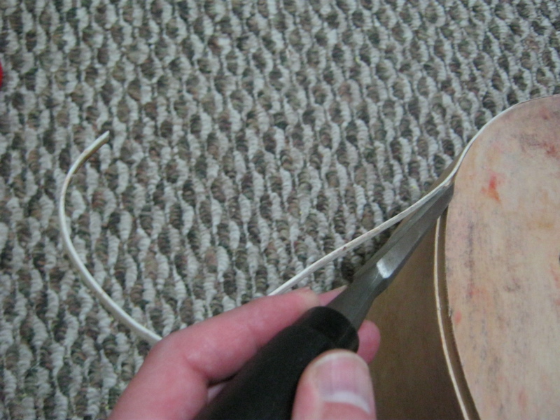 Removing the old plastic binding. I’ll be putting on some natural cocobolo wood binding.